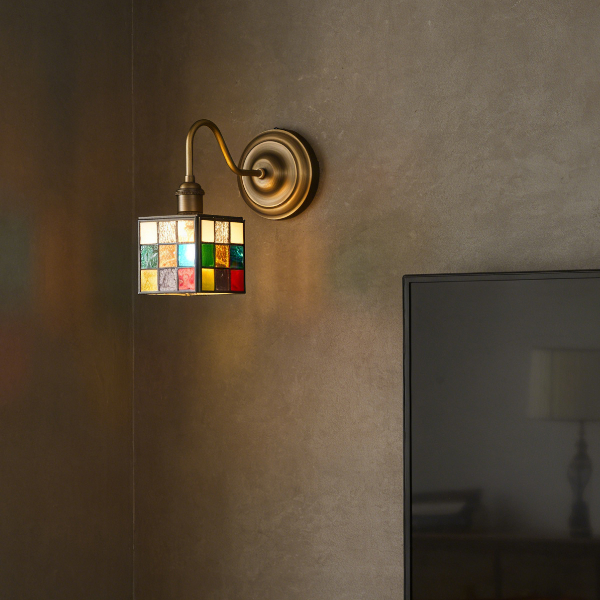 Small Square Colorful Glass Sconce 5 Tiffany style square glass sconce with antique brass hardware for a retro look.