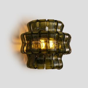 Elevate your home with this vintage green glass sconce. Featuring tiered, wavy olive glass and a warm amber glow, perfect for mid-century modern spaces. Shop now!