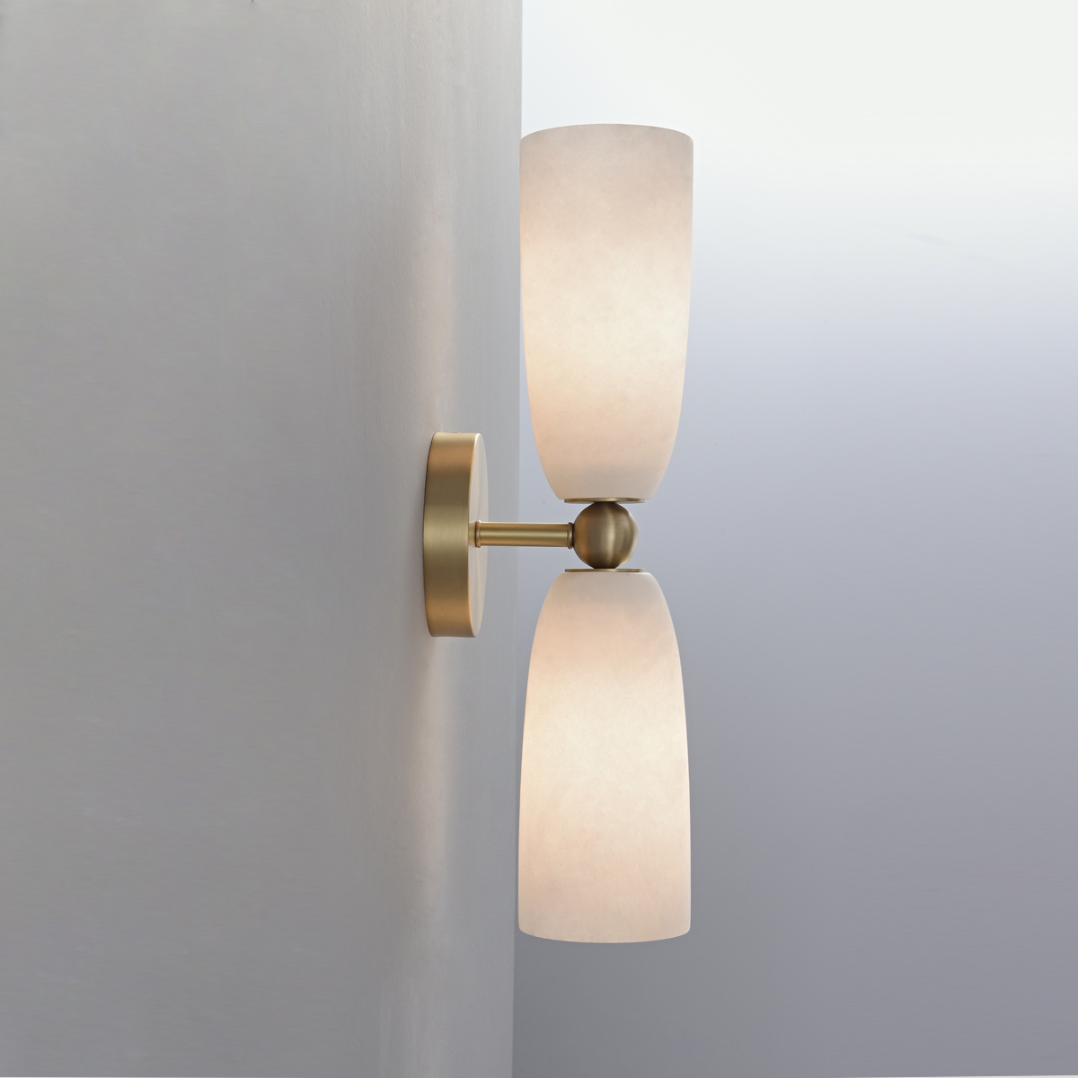 Modern Brass Frosted Glass Wall Sconce 3 Side view of an elegant brass bathroom wall lamp showing the round mounting plate