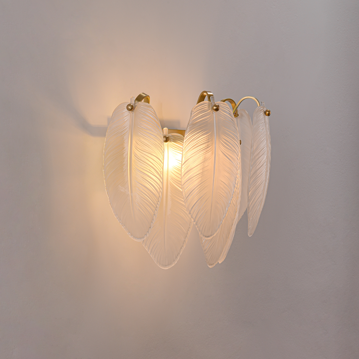 Modern Gold Leaf Glass Wall Sconce 2 Illuminated leaf-shaped glass wall light using G9 bulbs