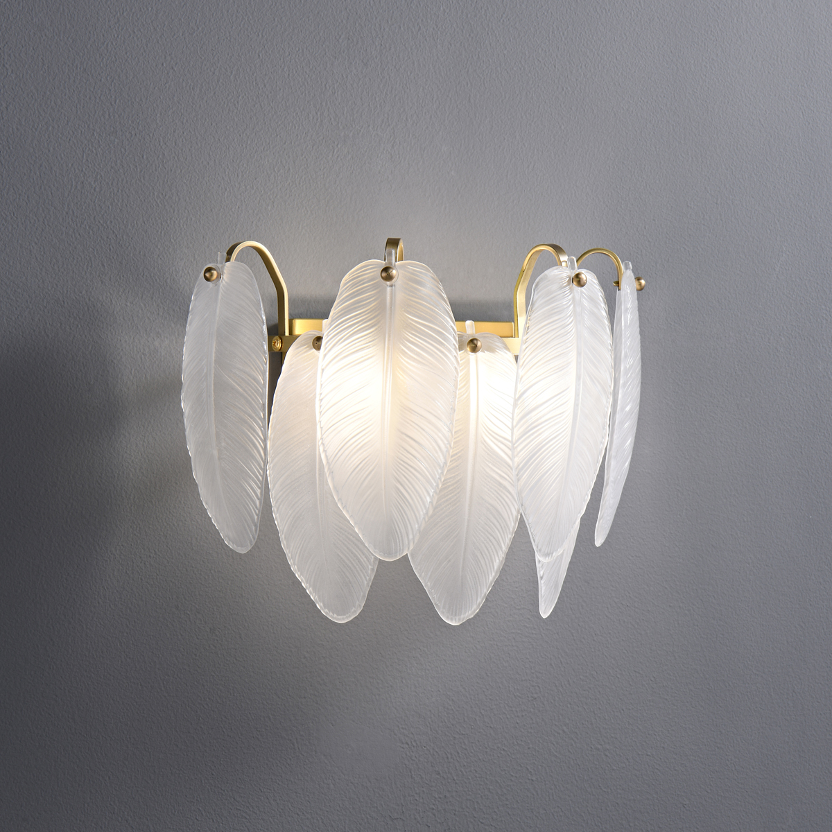 Modern Gold Leaf Glass Wall Sconce 4 Detail shot of a modern glass leaf wall sconce lighting fixture