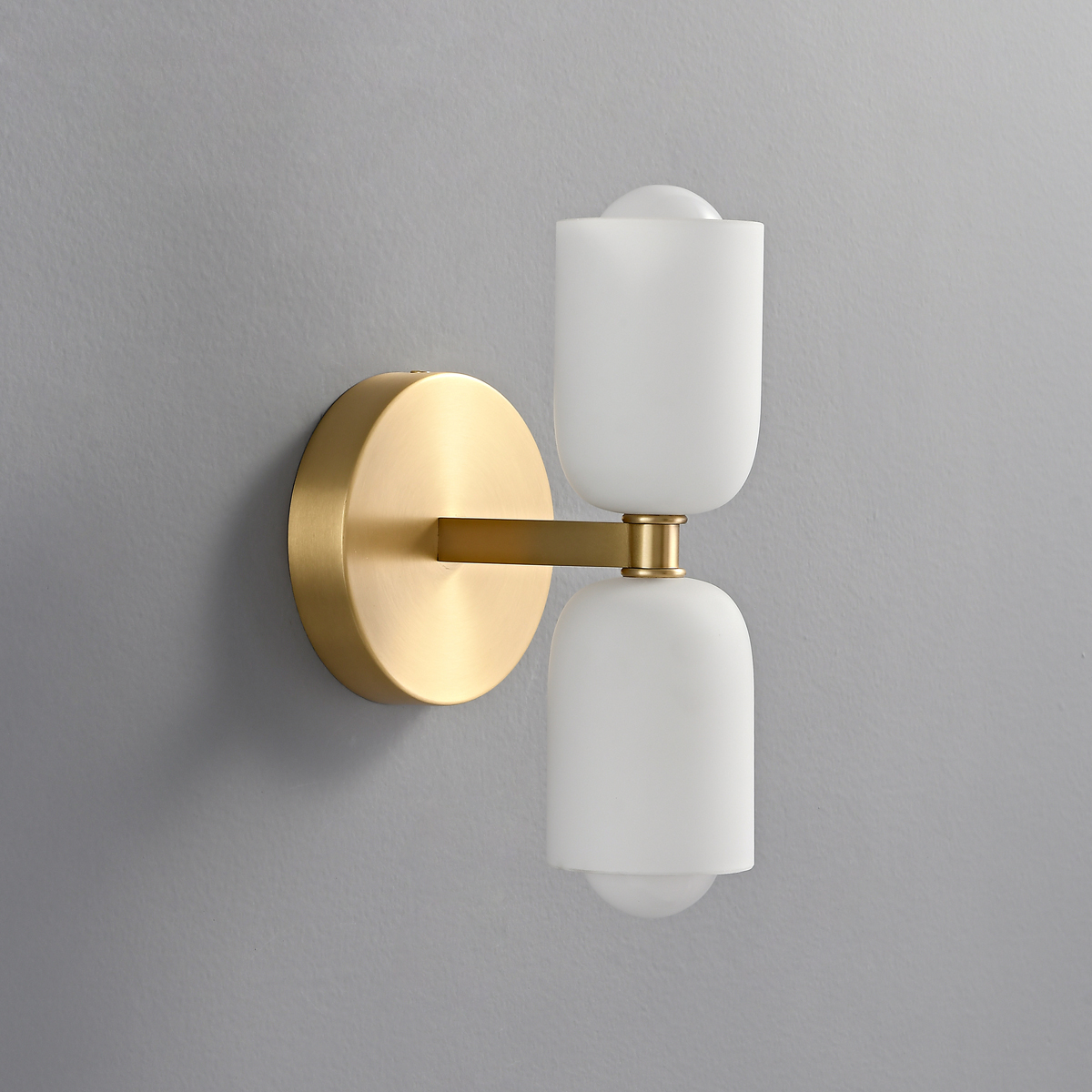 Mid-Century Modern Brass Wall Sconce 4 Unlit modern wall sconce showing the matte texture of the white frosted glass and brushed brass.